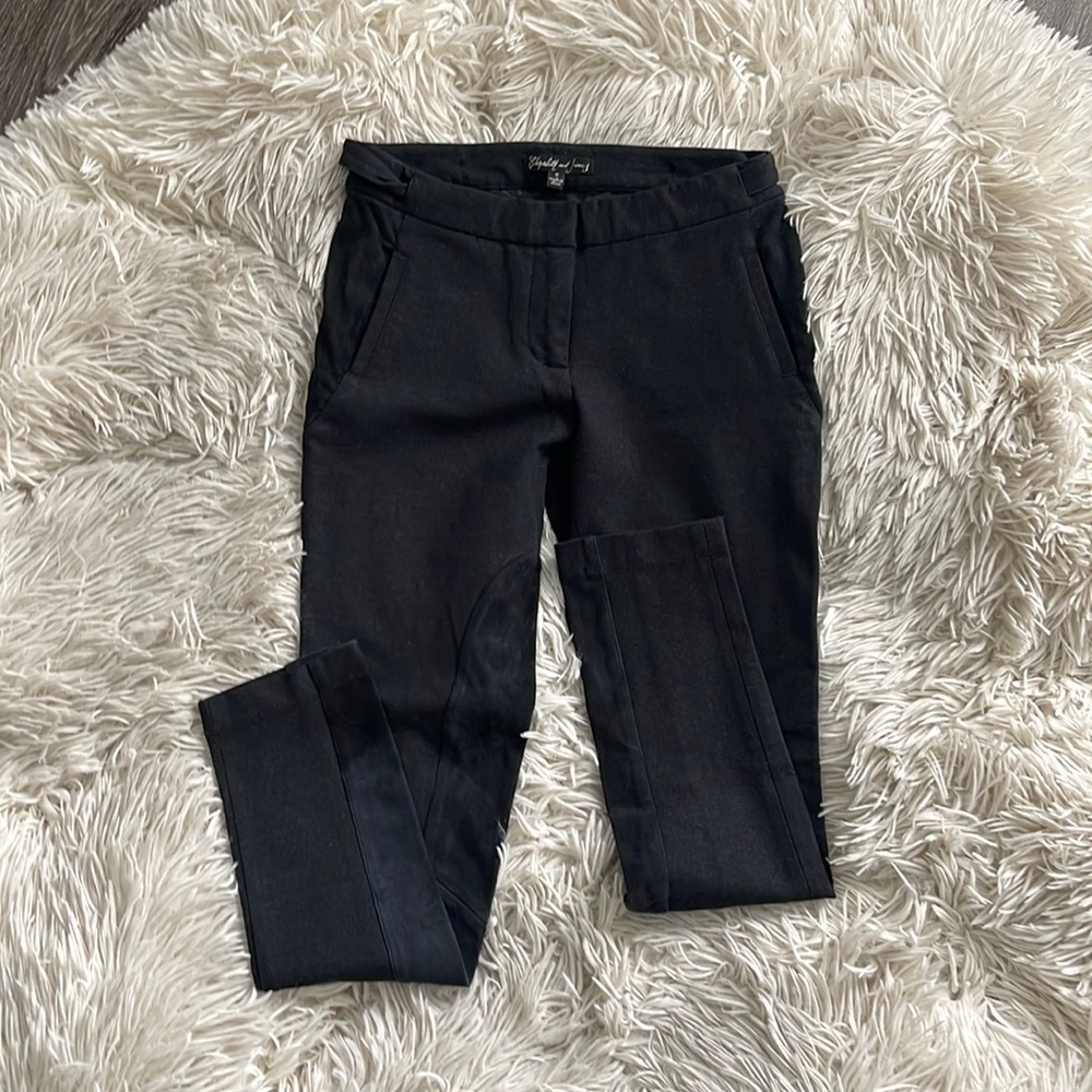 Beautiful two tone black pants. Wool and suede.